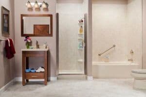Almond_Curved_Bath_and_Shower_Base_with_Travertine_6x6_Walls_and_Brushed_Nickel_Photo1_IMG_0692_HR